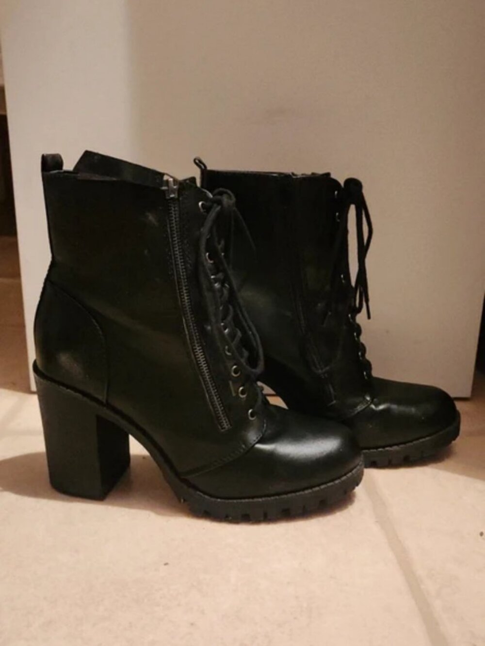 Black heel lace up boots